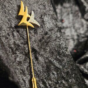 Vintage signed Trifari Arrow Tip Gold toned pin with Rhinestone accents